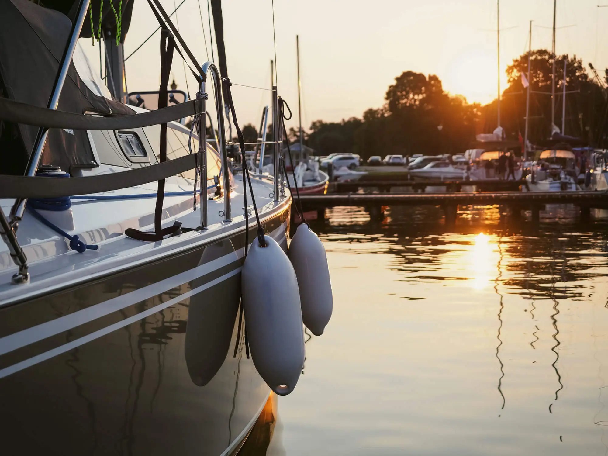 Shot of boats docked at sunset